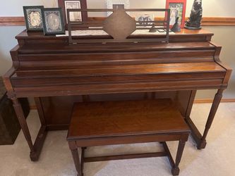 Spinet piano and bench