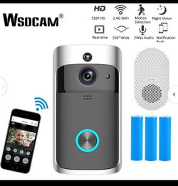 The doorbell is a security camera that includes 3 batteries and a charger