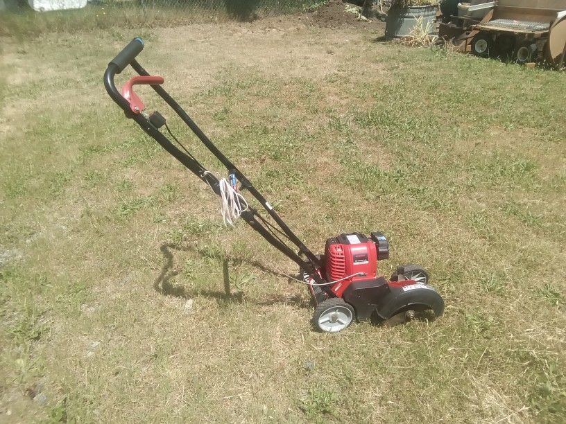 Troy Bilt Jump Start 4 Cycle Gas Edger, Needs Pull Cord Repair, ASIS. $30.00.