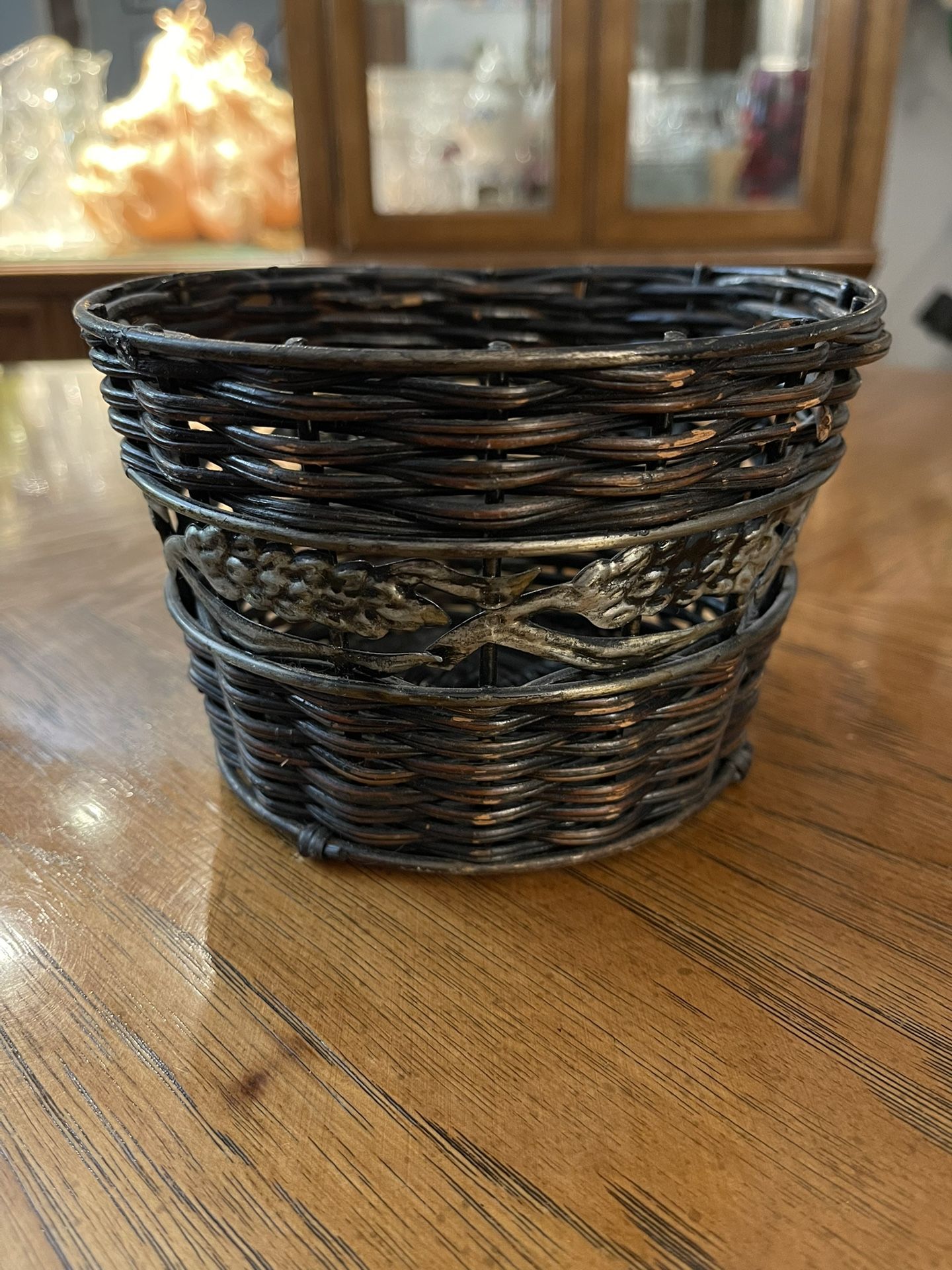 Round Brown Basket or Plant Holder with Decorative Metal Center and Structural Pieces