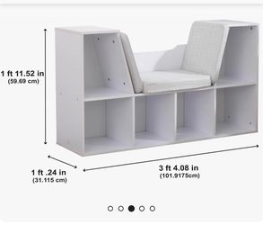 white kids book shelf with sitting nook