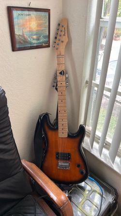 Davison electric guitar/ Squire Amplifier