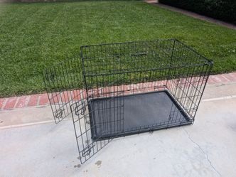 Dog crate gently used LIKE NEW double door foldable