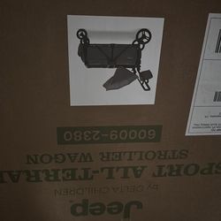 Unopened jeep stroller wagon