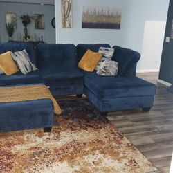Blue Sectional And Ottoman