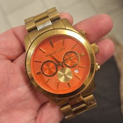 Michael Kors Red And Gold Runaway Watch