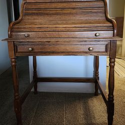 Little oak roll top desk.