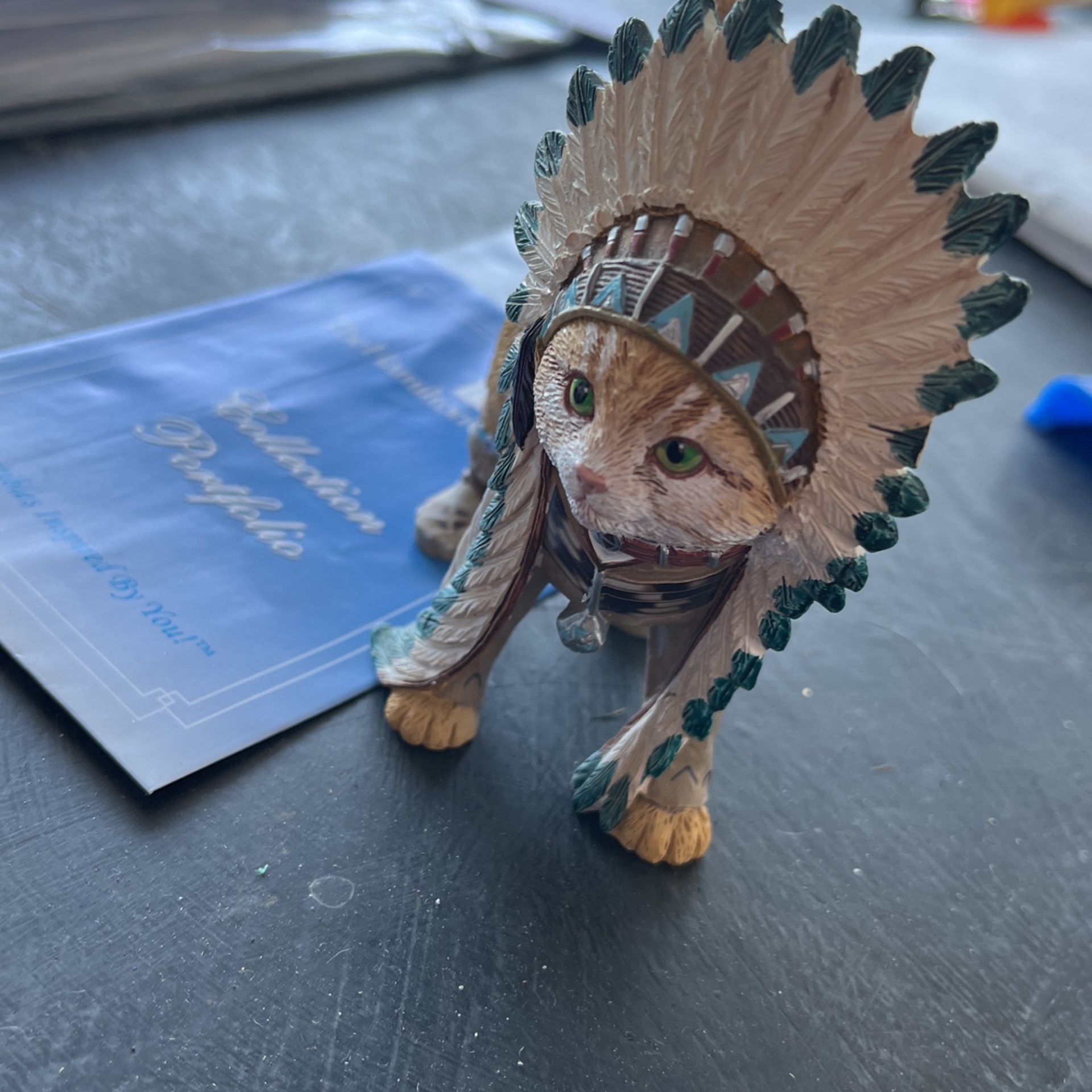 Chief runs with paws figurine