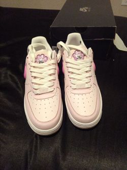 Female pink in white air forces size 8w