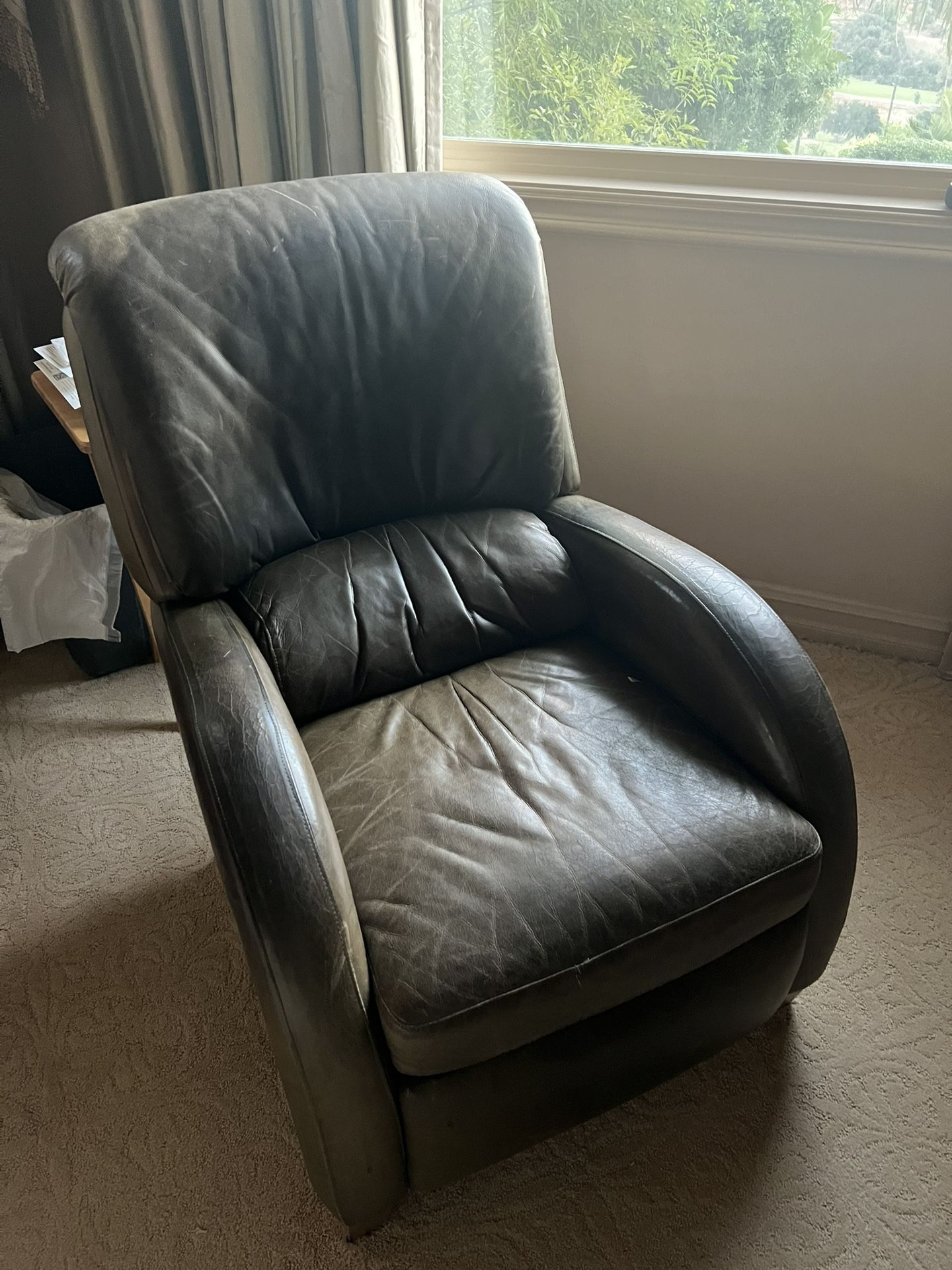Green leather Recliner 