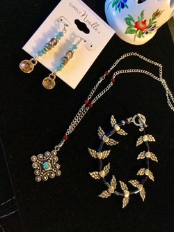 Assorted classy jewelry at Eva’s page / Silver necklace $25 / Heart bracelet $15 / Long Earrings gemstones $15