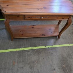 Rustic honey-toned finish entry/sofa table
