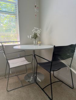 Round table (35 inches) and 2 IKEA chairs