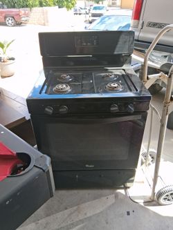 Still like new whirlpool Gas stove