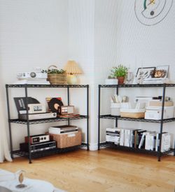 Pair of metal shelving units.