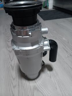 XO GARBAGE DISPOSAL ..LIKE NEW