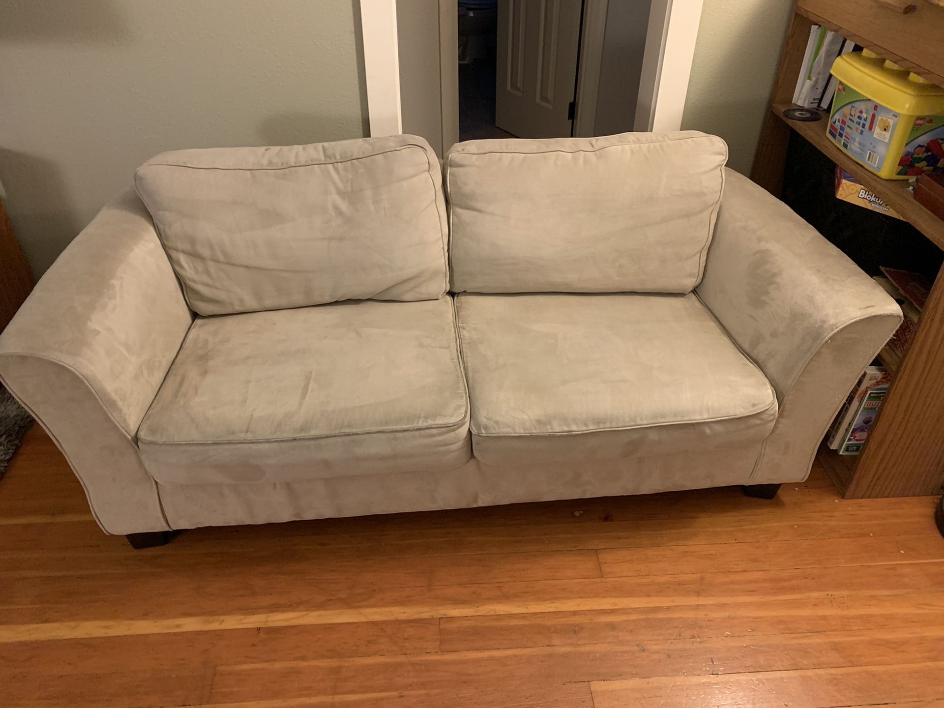 Small couch/sofa or loveseat.