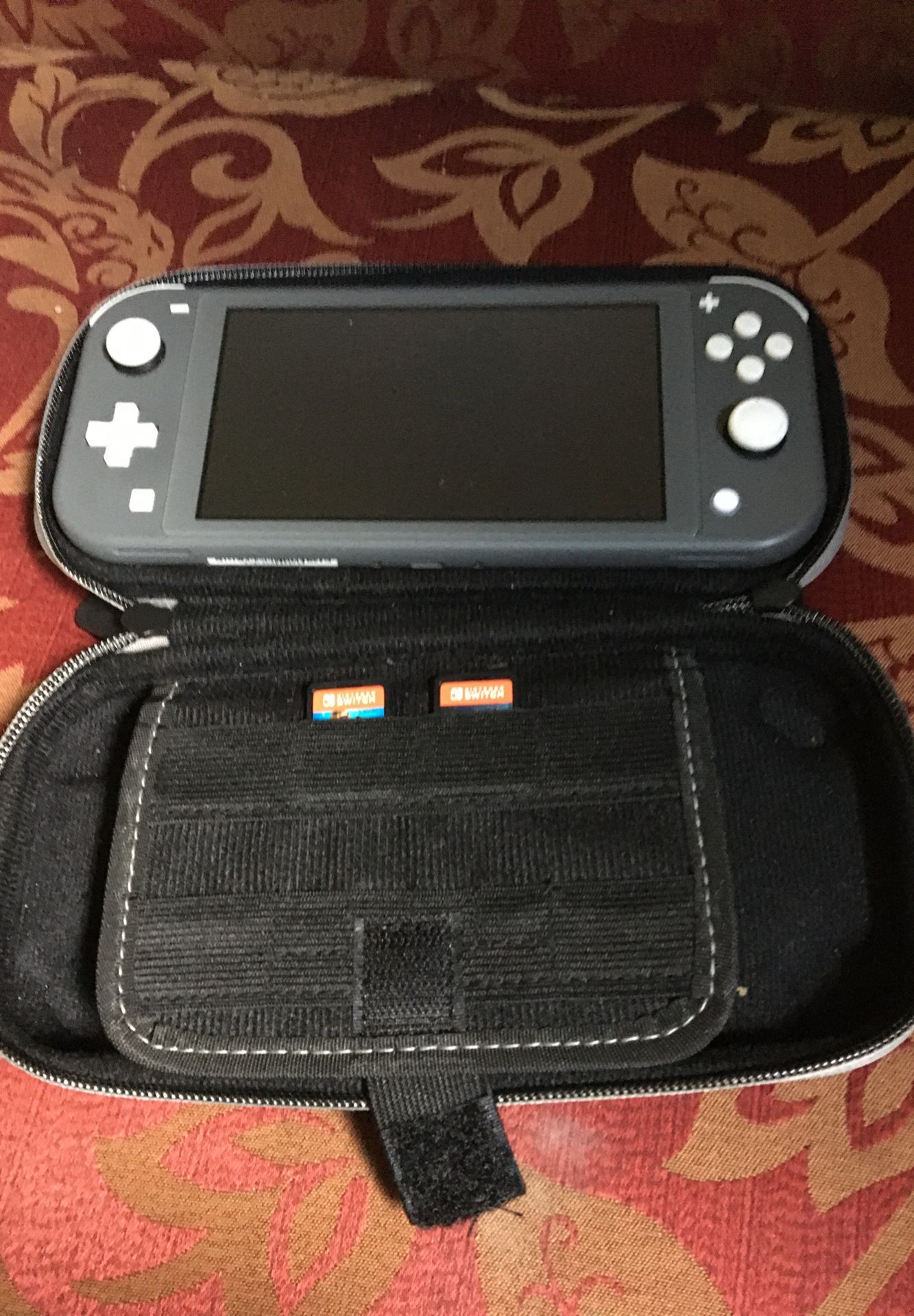 Nintendo switch lite..lookin to trade electronics or collectible action figures