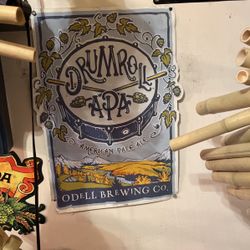 odell brewing drumroll ipa metal sign