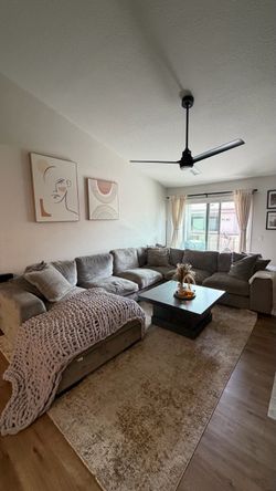 Gray U shaped section with storage