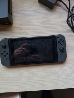 Nintendo Switch with Gray Joy‑Con