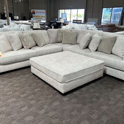 Deep Comfy Beige Sectional And Pillows 