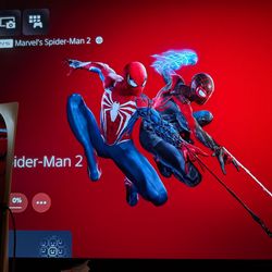 PS5 with 3 games. Spider-Man 2, Demon's Souls, FF 7
