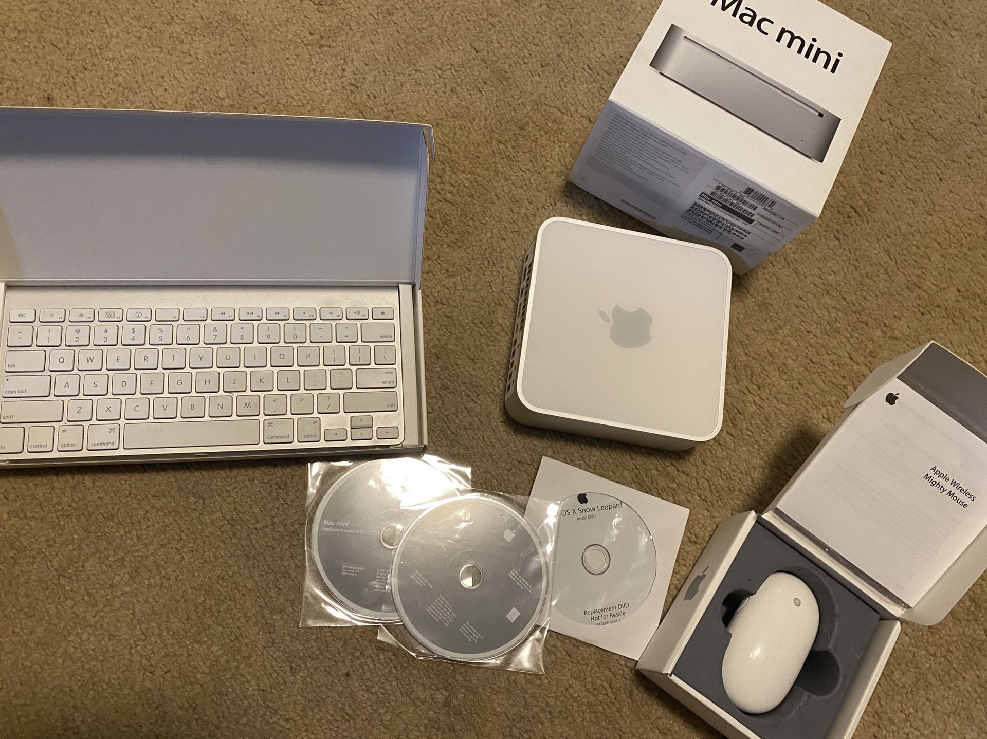 Apple Mac Mini + wireless Mighty Mouse + wireless Apple keyboard