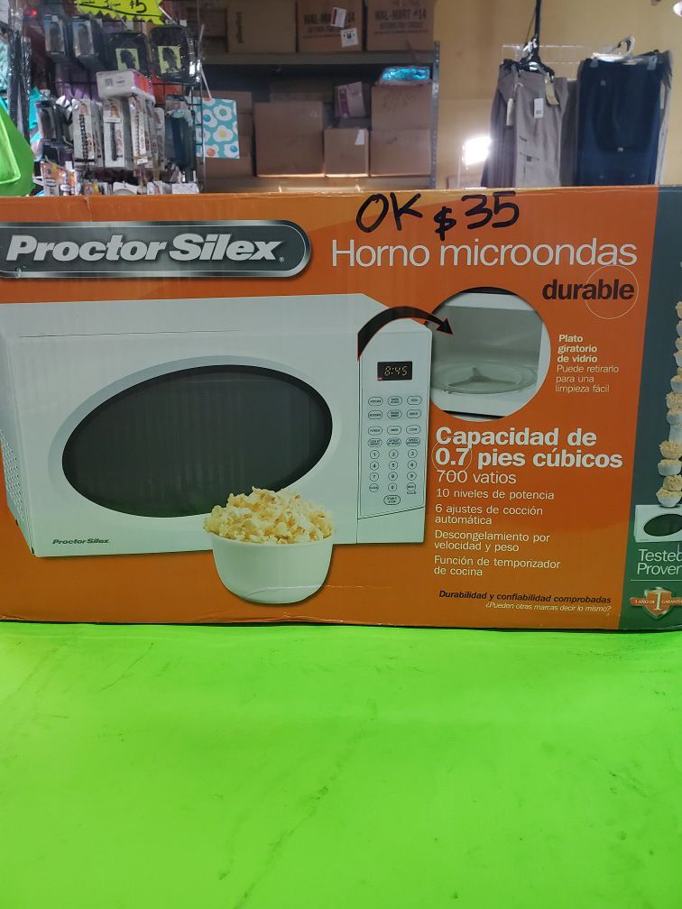 Microwave oven 0.7 cu ft new only open box.firme price