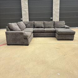 Reversible Gray Sectional. Delivery Available. 