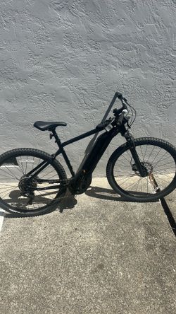 GIANT ROAM E+ GTS with upgraded handlebars and tires