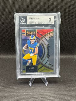 Puka Nacua Rookie Select Red & Yellow Prizm Die-Cut
