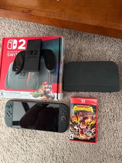 Nintendo Switch 2 (Like New) w/ original box and Pro Controller & Donkey Kong Bananza