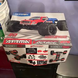 1/10 GRANITE VOLTAGE 2WD RTR BRUSHED MONSTER TRUCK (BATTERY & CHARGER INCLUDED), RED/BLACK