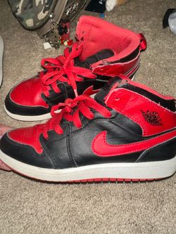 Black and Red Jordan 1 mids