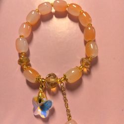 Butterfly Charm Bracelet Light Orange In Color