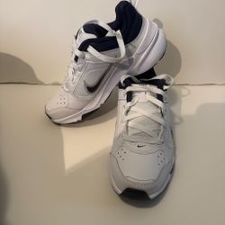 White and navy blue Nike women’s sneakers. Size 4.5