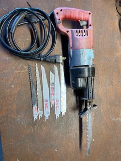 Milwaukee Sawzall with extra blades.