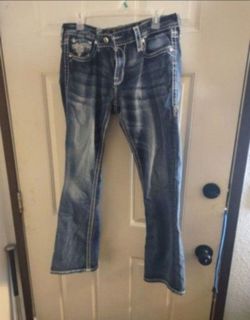 2 very Nice women's jeans, rock revival will not separate.
