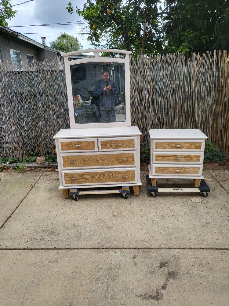 Dresser with mirror and night stand.