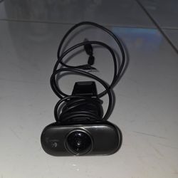 Logitech C210 USB HD webcam, clip-on for monitor, built-in microphone.