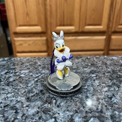 Walt Disney 100 Mickey Mouse and friend’s Christmas Ornament “Daisy Duck”.  Removed from set which is listed, another customer wanted one ornament.   