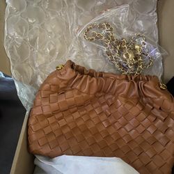 NEW, Boxed, Woven leather small  “dumpling Crossbody bag”