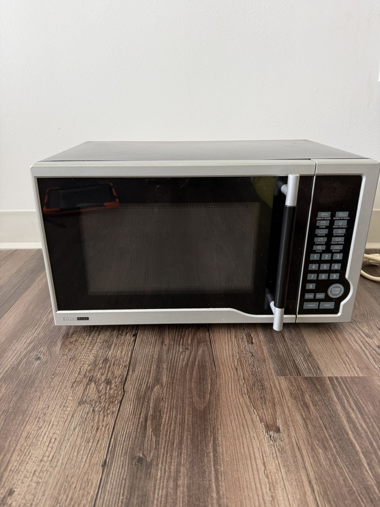 Black/silver Microwave From Living Home