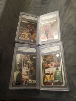 Four 1990s Michael Jordan graded PGS 8NM/MT