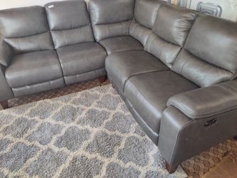 Rizzo heights leather power reclining sectional with power headrests outlet