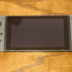 Nintendo Switch With Grey Joycons And Dock