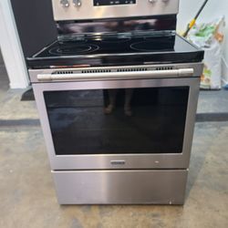 Maytag Stailess Steel Stove With Dent Shown On Picture