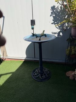 Rustic metal bird bath
