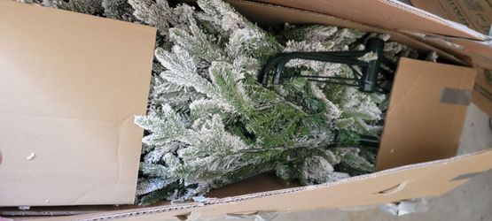 8ft non-lit flocked Christmas tree w/ornaments